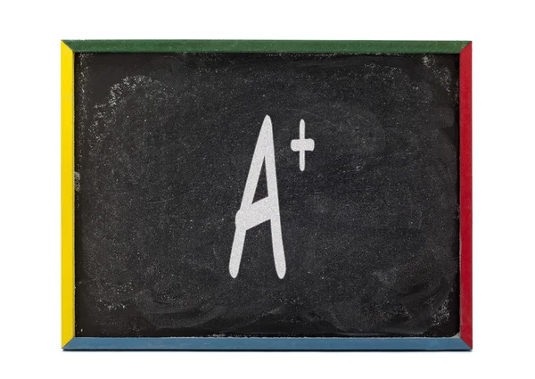 A written on small students slate board — Zdjęcie stockowe