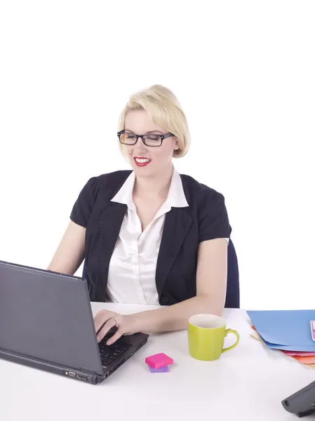 A beautiful businesswoman on the laptop — Stock Photo, Image