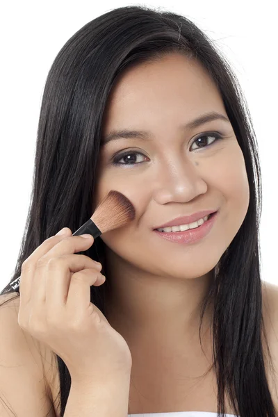 A beautiful lady applying make up — Stock Photo, Image