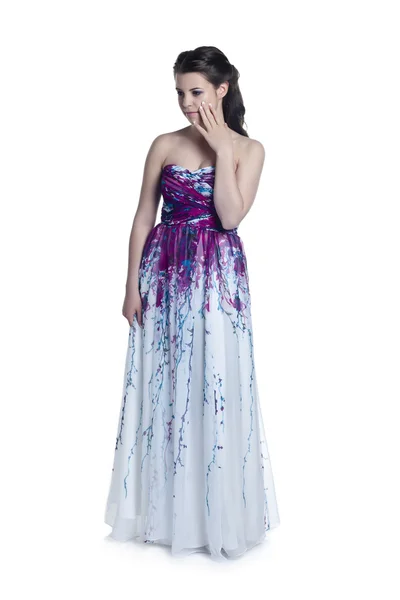 Eine schöne Frau in lila langem Kleid — Stockfoto