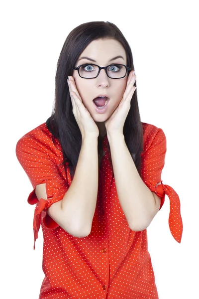 Eine schöne Frau mit einem überraschten Blick im Gesicht — Stockfoto