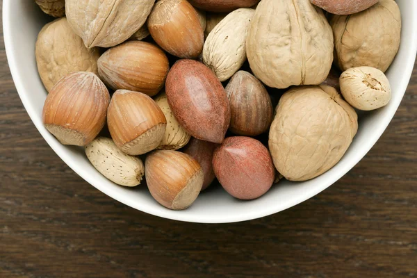 A bowl of hazelnuts — Stock Photo, Image