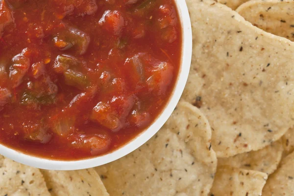 A bowl of salsa and chips — Stock Photo, Image