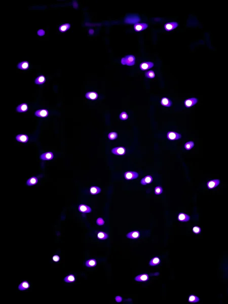 286 defocused image of purple halloween neon lights — Stock Photo, Image