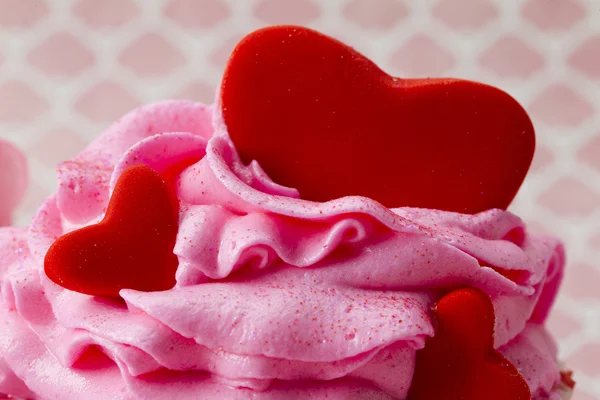 A cupcake with a large heart in it — Stock Photo, Image