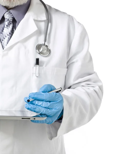 A doctor wearing blue hand glove with tablet — Stock Photo, Image