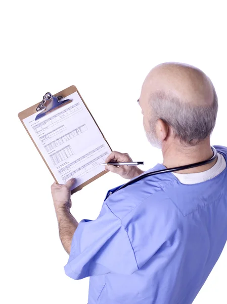 A doctor writing on medical clipboard — Stock Photo, Image