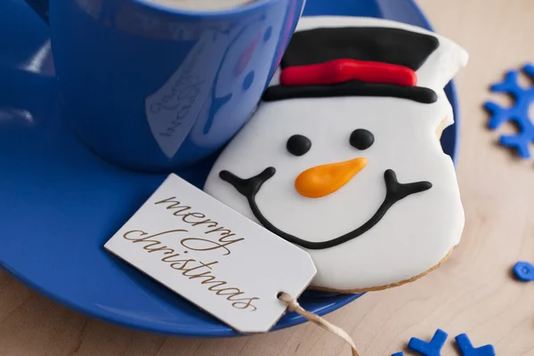 Una cara de una galleta muñeco de nieve — Foto de Stock