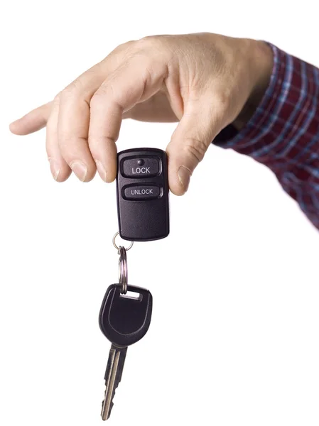 A hand holding a car key — Stock Photo, Image