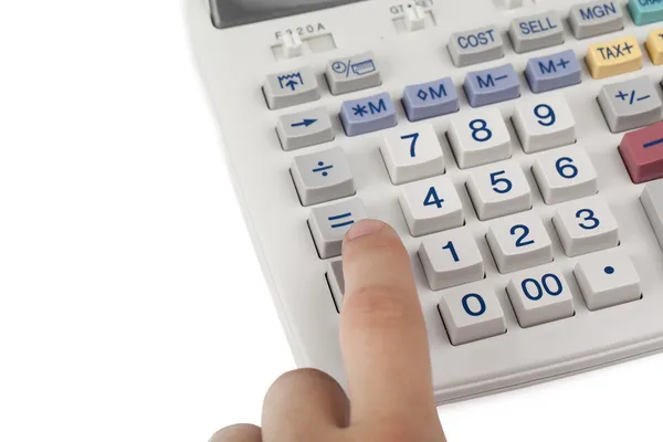 Uma mão na almofada da calculadora — Fotografia de Stock