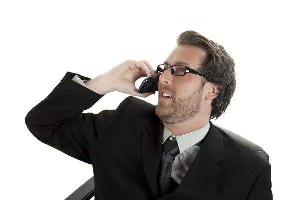 A handsome businessman talking on the cellphone — Stock Photo, Image