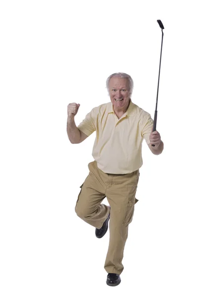 A happy senior man holding golf club — Stock Photo, Image