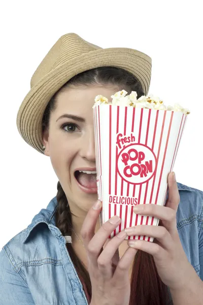 A happy teenage holding a popcorn — Stock Photo, Image