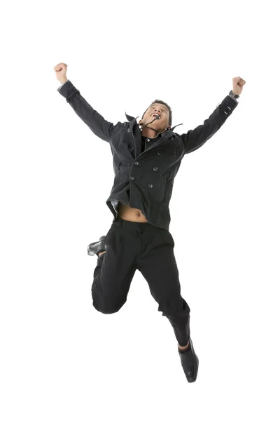 Ein glücklicher junger Mann springt — Stockfoto