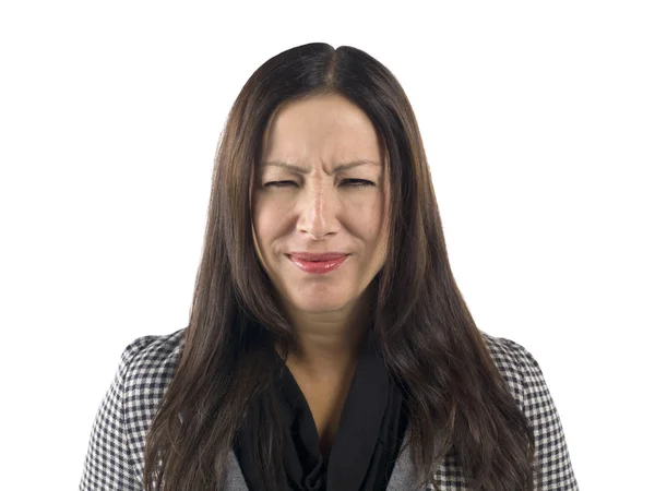 Uma mulher em um rosto triste — Fotografia de Stock