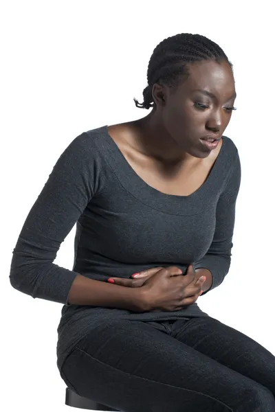 A woman with a stomach ache — Stock Photo, Image