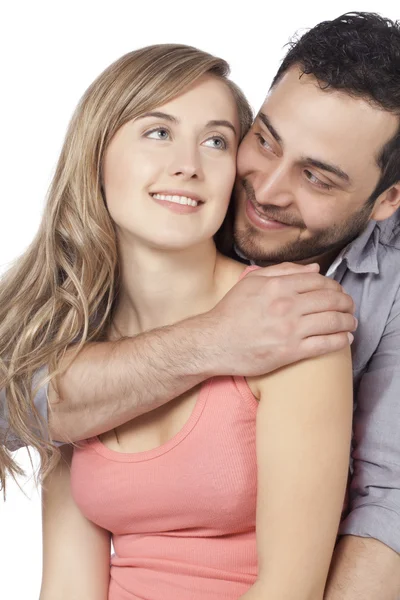 A young husband hugging his wife from the back — Stock Photo, Image