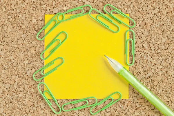 Adhesive paper with paper clips and ball pen — Stock Photo, Image