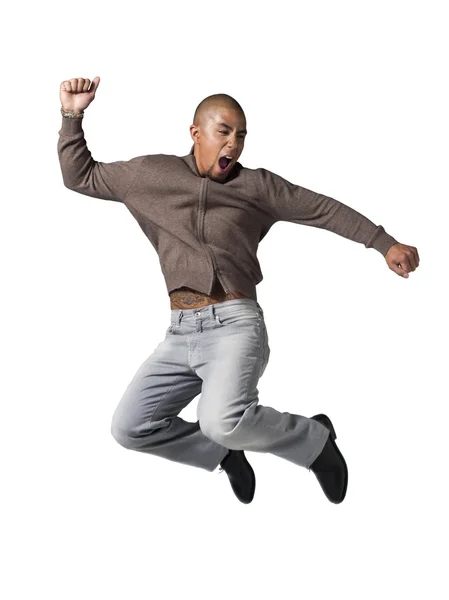 Hombre afroamericano saltando en el aire — Foto de Stock