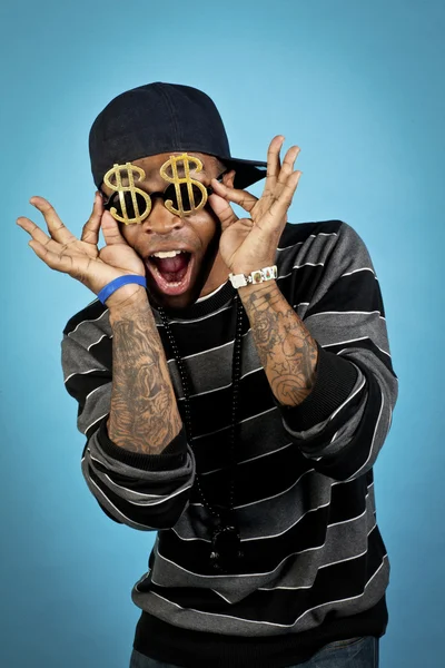 African american man wearing dollar sunglasses — Stock Photo, Image