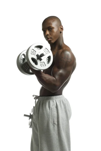 Hombre afroamericano haciendo ejercicio con la mancuerna —  Fotos de Stock
