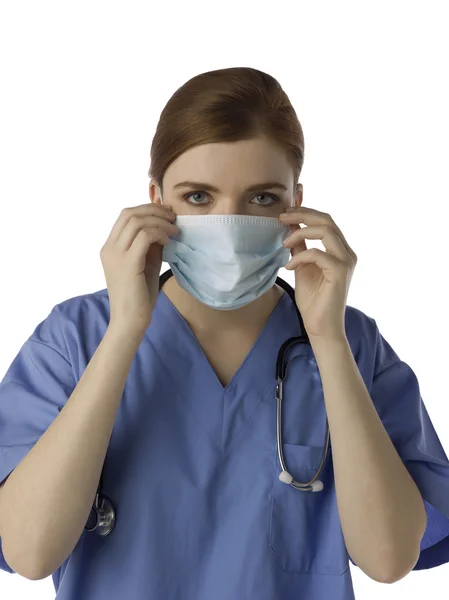 A female doctor wearing medical mask Stock Image