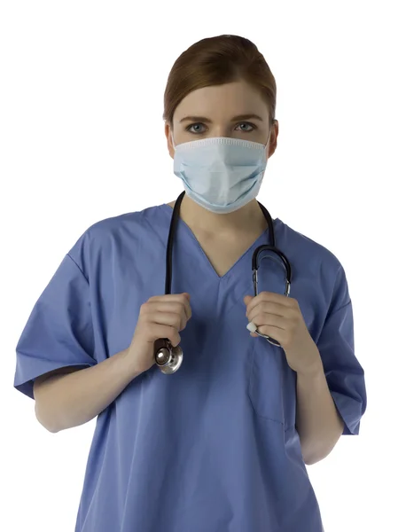 A female doctor with a medical face mask Stock Photo