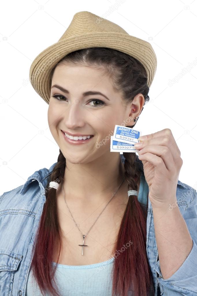 a woman holding movie tickets