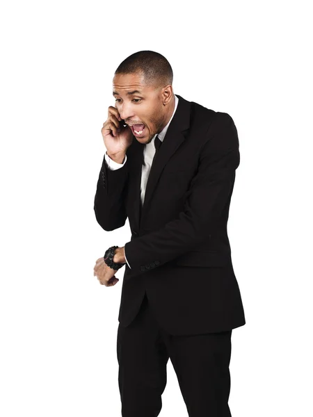Angry businessman shouting on mobile phone — Stockfoto