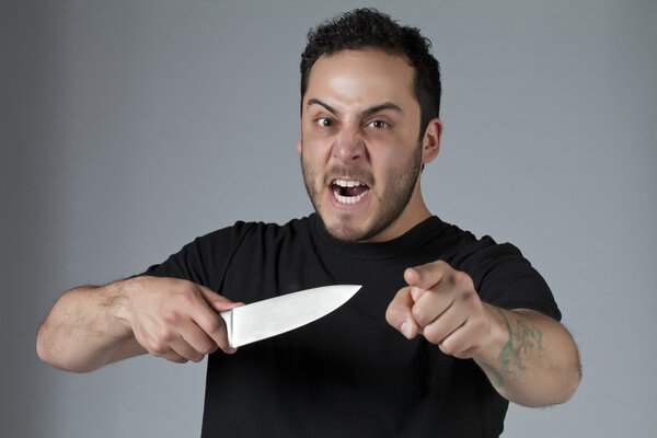 angry man with a knife