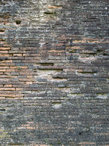 Antieke bakstenen muur — Stockfoto