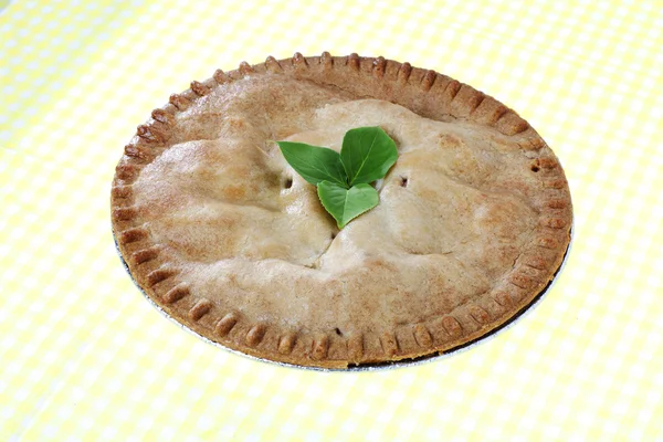 Apple pie over table cloth — Stock Photo, Image