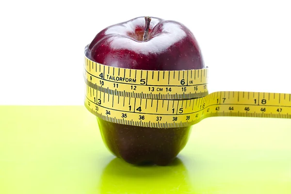 Apples being measured — Stock Photo, Image