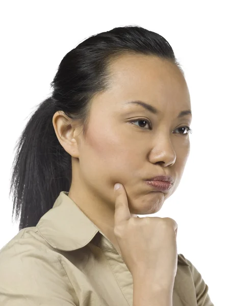 Asiatico ragazza in pensiero gesto — Foto Stock