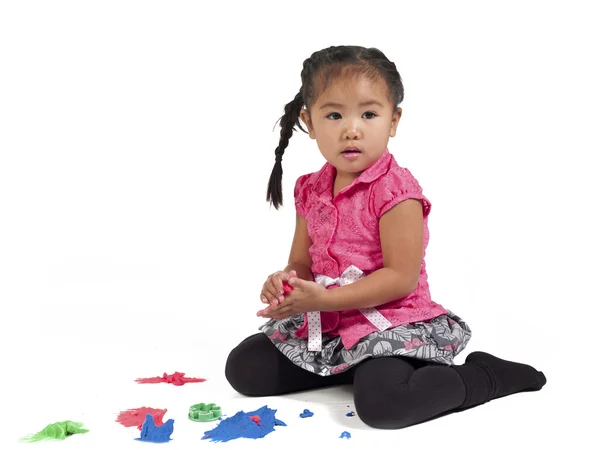 Asian girl playing with play dough — Stock Photo, Image