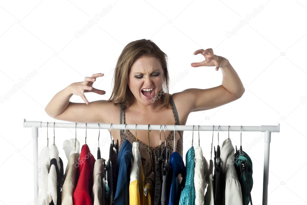 angry woman choosing clothes