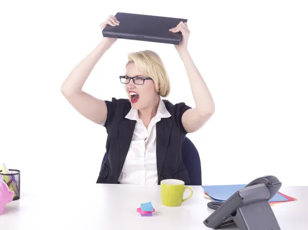 Angry businesswoman with laptop — Stock Photo, Image