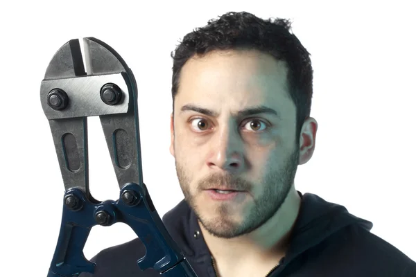 Angry man holding bolt cutter — Stock Photo, Image