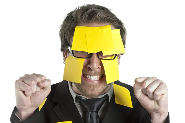 Angry stressed businessman with sticky notes — Stock Photo, Image