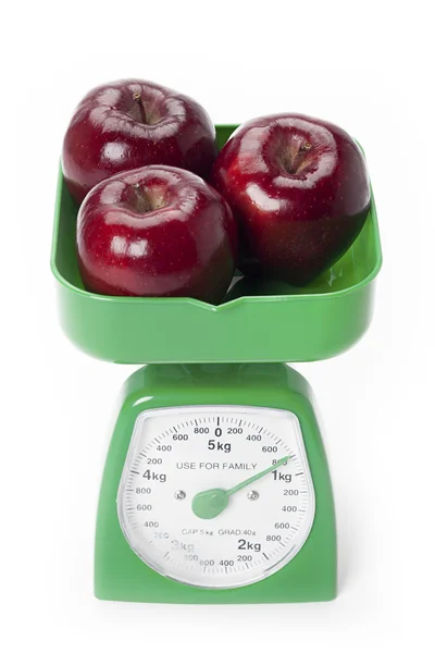 Apples on scale — Stock Photo, Image