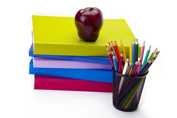 Art materials and an apple — Stock Photo, Image