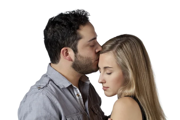 A man kisses a lady on the forehead — Stock Photo, Image