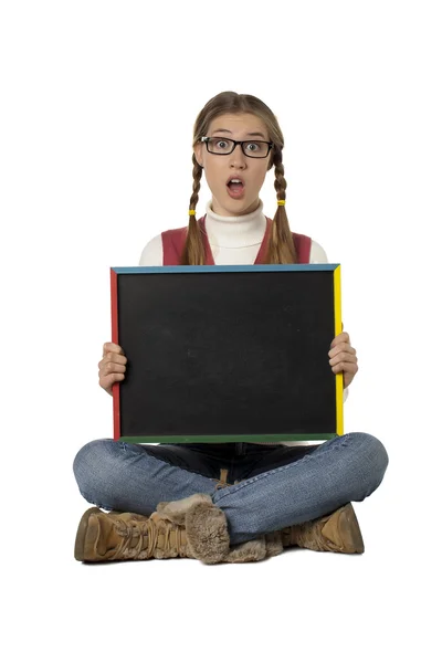 A shocked woman holding black board — Stock Photo, Image