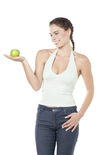 Een sexy vrouw met apple op haar palm — Stockfoto