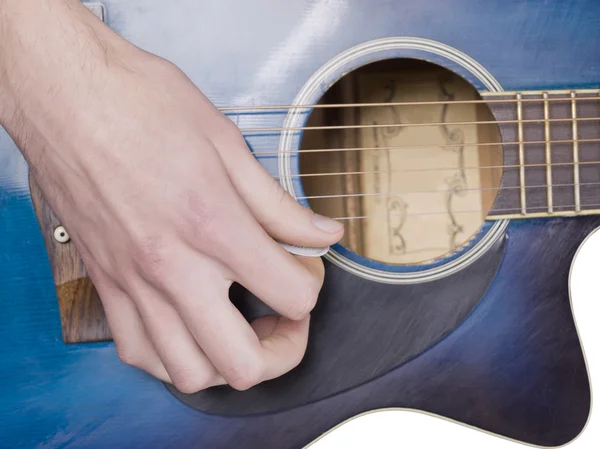 Um homem dedilhando guitarra — Fotografia de Stock