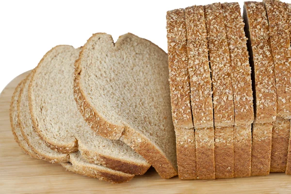 Et brød med friskbagt brød - Stock-foto