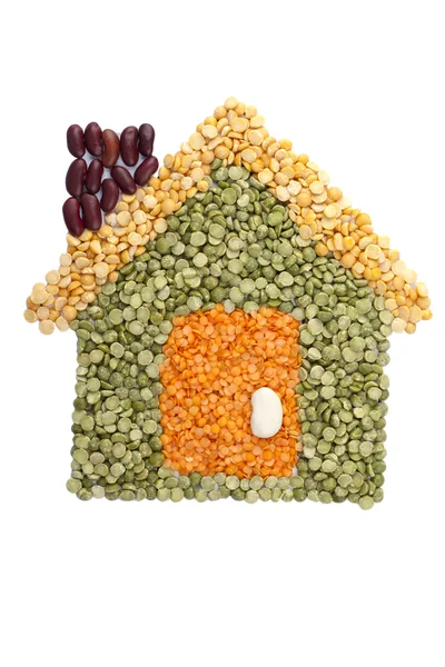 Assorted beans forming a house — Stock Photo, Image