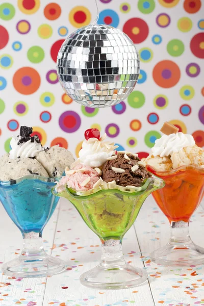 Assorted ice cream flavors and disco ball — Stock Photo, Image