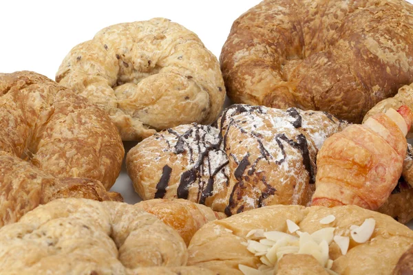 Assortment of baked croissants — Stock Photo, Image