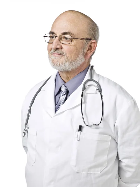 A male doctor with stethoscope looking to the side Royalty Free Stock Images